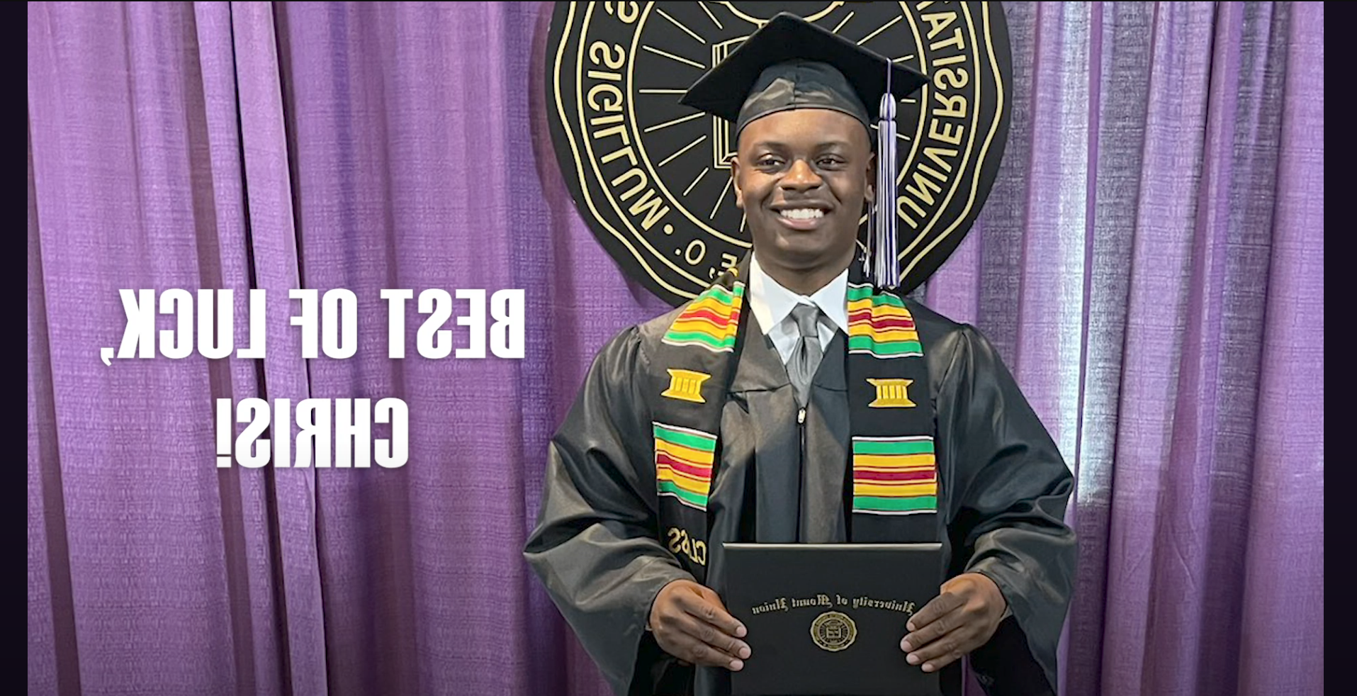 chris painter holding diploma